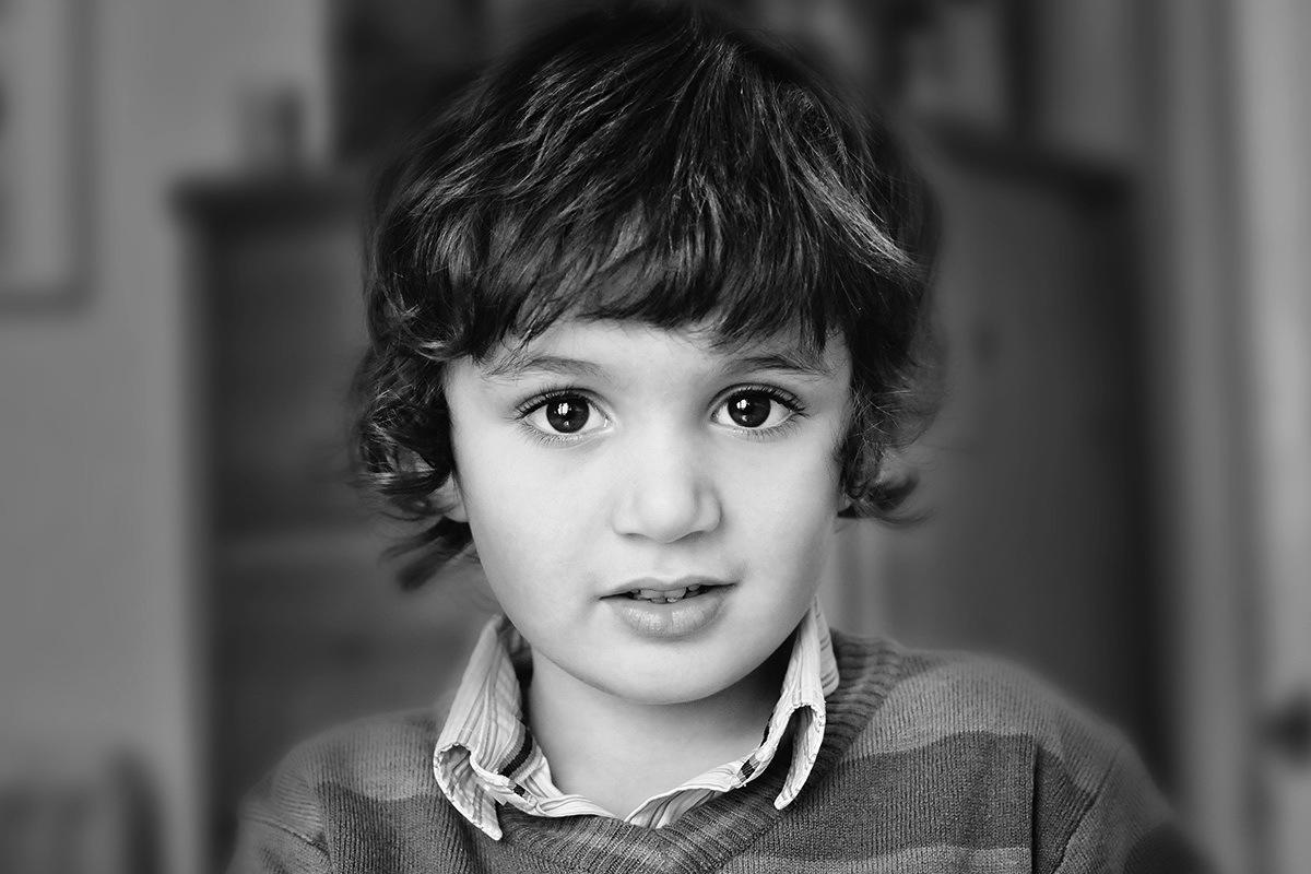 black and whit image of small boy by samantha brown photography