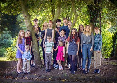 portrait of 17 grandchildren in the park, by samantha brown photography