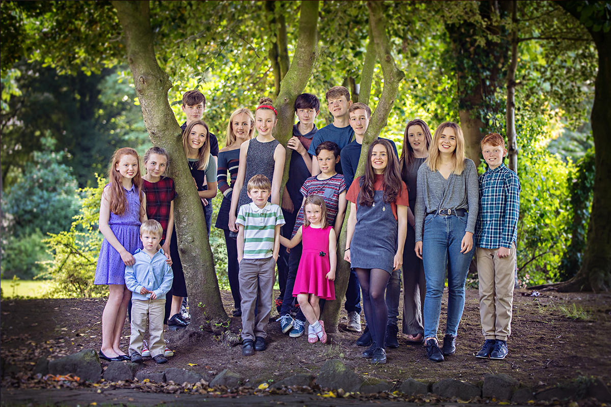 portrait of 17 grandchildren in the park, by samantha brown photography