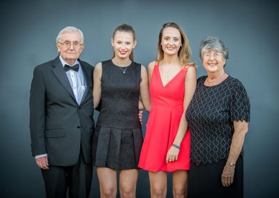 two sisters with their grandparents